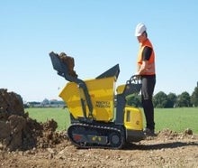 Kettendumper Neuson TD9 mit Selbstladeschaufel Muldenkipper