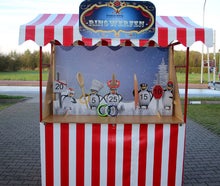 Pinguin-Ringwerfen im Nostalgiestand