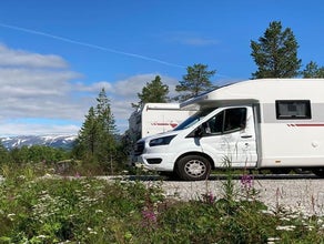 KATEGORIE 2.1 - Roller Team Kronos 287 Face-To-Face Teilintegriert mit Hubbett - 4 Schlafplätze, 4 Mitfahrplätze
