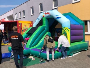 Hüpfburg Dino mit Rutsche