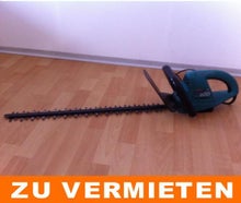 Elektro-Heckenschere / Heckenschere / Hecke schneiden / Elektrische Heckenschere