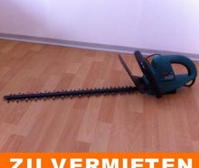 Elektro-Heckenschere / Heckenschere / Hecke schneiden / Elektrische Heckenschere