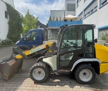 Radlader Mieten - Kramer mit Wanne und Gabeln