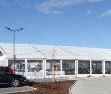 Festzelt 15m x 30m weiß mit 50% Sprossenfenster oder transparenten Planen.