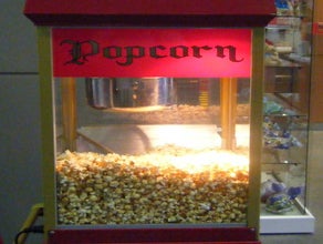 Rote Popcornmaschine im nostalgischen Flair inkl. 19% MwSt.