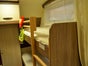 Wohnwagen Bürstner 510 TK- PLUS 7-Pers. Doppelhubbett / Kinderzimmer - Galerie - Bild 2