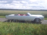 Cadillac de Ville Cabriolet in schnee-weiß - traumhafter Strassenkreuzer-Oldtimer aus dem Jahr 1965