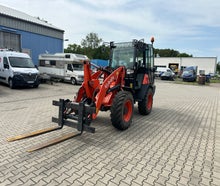 Kubota R090 mit Schaufel oder Gabel