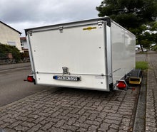 Kofferanhänger mit Absenkmechanik