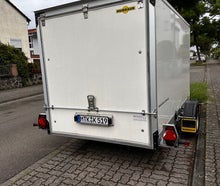 Kofferanhänger mit Absenkmechanik