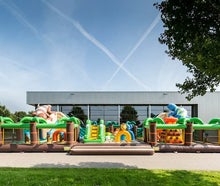 XXL Hüpfburg Jungle World mieten Dschungle Wilde Tiere Rutsche Kletterberg