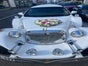 Excalibur Oldtimer Stretchlimousine in Weiß mit rotem Teppich und einer Sektflasche - Galerie - Bild 4