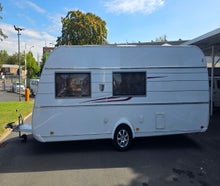Wohnwagen Tabbert Vivaldi 560 mit 2 Einzelbetten und einem Stockbett
